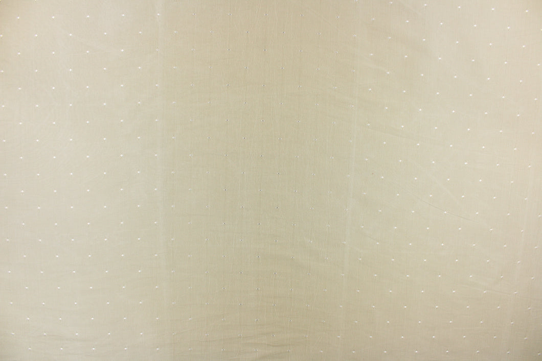  This beautiful jacquard fabric features an embroider pin head design in a pale gray beige.
