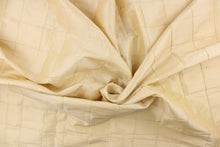 Load image into Gallery viewer,  This beautiful jacquard fabric features an pin tuck block design in a light khaki color.
