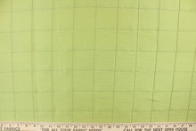 Load image into Gallery viewer,  This beautiful jacquard fabric features an pin tuck block design in a lime green color.
