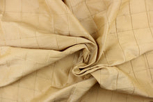 Load image into Gallery viewer, This beautiful jacquard fabric features an pin tuck block design in a gold khaki color.
