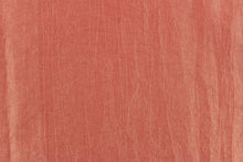 Load image into Gallery viewer, This taffeta fabric features a crinkle in iridescent coral pink with hints of gold. 
