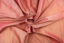 Load image into Gallery viewer, This taffeta fabric features a crinkle in iridescent coral pink with hints of gold. 

