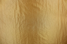 Load image into Gallery viewer, This taffeta fabric features a crinkle in iridescent gold. 

