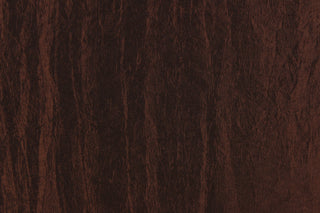 This taffeta fabric features a crinkle in iridescent rich brown. 