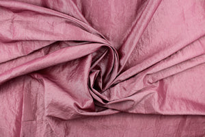 This taffeta fabric features a crinkle design in a beautiful mauve. 