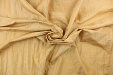 Load image into Gallery viewer, This taffeta fabric features a crinkle design in gold. 
