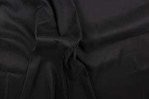 This taffeta fabric in a solid black.