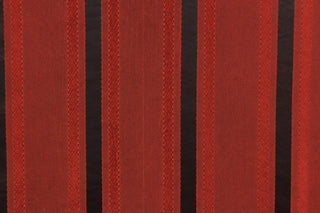 This stunning yarn dyed fabric features a striped pattern in a rich red and black.