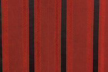 Load image into Gallery viewer, This stunning yarn dyed fabric features a striped pattern in a rich red and black.
