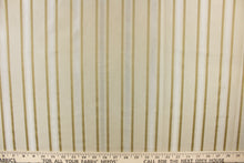 Load image into Gallery viewer, This stunning yarn dyed fabric features a striped pattern in beige and taupe
