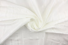 Load image into Gallery viewer, This stunning yarn dyed fabric features a striped pattern in bright white. 
