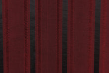 Load image into Gallery viewer, This stunning yarn dyed fabric features a striped pattern in deep red tone and black.
