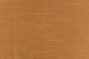 A mock linen fabric in a rich solid golden tan