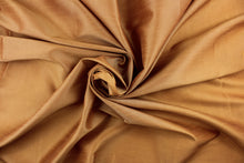 Load image into Gallery viewer, A mock linen fabric in a rich solid golden tan
