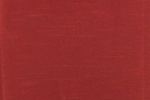  A mock linen fabric in a solid brick red