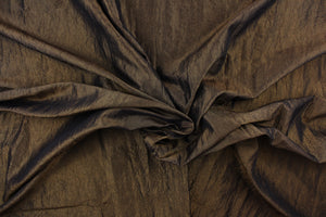  This taffeta fabric features a crinkle iridescent in dark brown.
