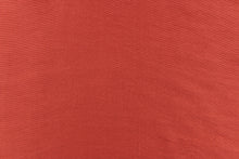 Load image into Gallery viewer, This taffeta fabric in a solid brick red. 
