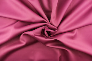 This beautiful versatile fabric offers a slight sheen in a solid mauve. 