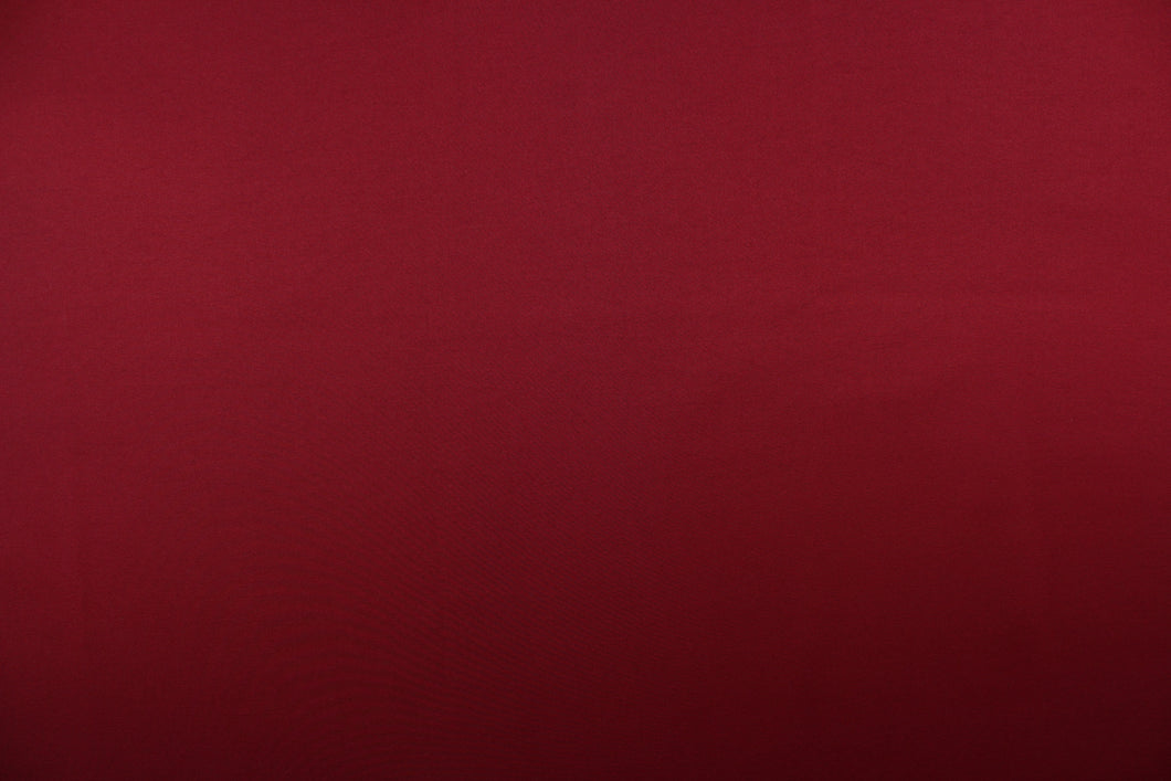 This beautiful versatile fabric offers a slight sheen in a solid burgundy.