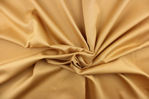 This beautiful versatile fabric offers a slight sheen in a solid manilla gold. 