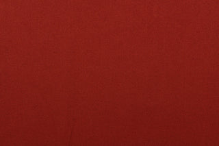 This beautiful versatile fabric offers a slight sheen in a solid dark brick red.