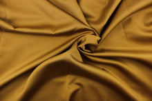 Load image into Gallery viewer, This beautiful versatile fabric offers a slight sheen in a solid dark gold .
