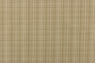 This stunning yarn dyed fabric features a small plaid design in shades of khaki and beige.