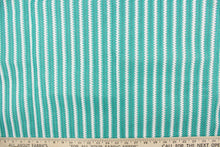 Load image into Gallery viewer, This green and white striped fabric is perfect for outdoor settings and indoors in sunny rooms. 
