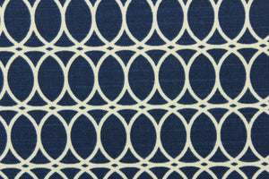 This contemporary design features interlocking white circles set against a navy blue background background.