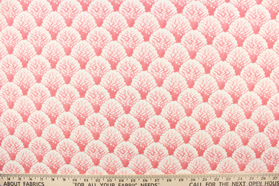  This fabric features white coral set against a flamingo pink background.  