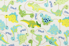 Load image into Gallery viewer, This cute playful print features dinosaurs in green, blue, yellow and brown on a white background.
