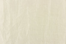 Load image into Gallery viewer, This taffeta fabric features a crinkle design in a rich cream color. 
