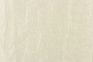 This taffeta fabric features a crinkle design in a rich cream color. 