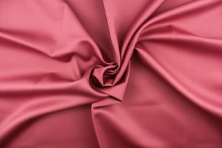 This beautiful versatile fabric offers a slight sheen in a solid dark rose color.