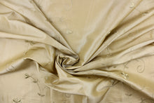 Load image into Gallery viewer,  This beautiful jacquard fabric features an embroider floral design in a khaki color. 
