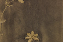 Load image into Gallery viewer,  This beautiful fabric features an embroider floral design in a iridescent dark olive green

