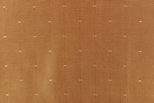 Load image into Gallery viewer, This beautiful jacquard fabric features an embroider pin head design in gold. 
