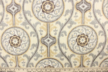 Load image into Gallery viewer, This fabric features a medallion print design that has an aged and distressed look.  Colors include slate gray, tan, charcoal and off white. 
