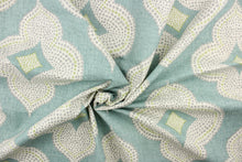 Load image into Gallery viewer, This fabric features a fun geometric print design. Colors include green, gray, white and turquoise.
