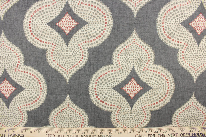  This fabric features a geometric print design.  Colors include red, gray, off white.