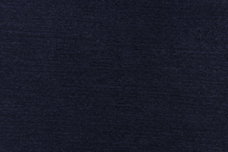 This suede fabric features a weave design in a solid deep blue. 