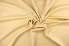 Load image into Gallery viewer, This beautiful versatile fabric offers a slight sheen in a solid pale tan.
