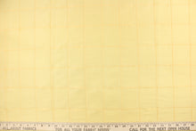 Load image into Gallery viewer, This beautiful jacquard fabric features an pin tuck block design in a rich butter yellow color.
