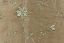 Load image into Gallery viewer, This beautiful jacquard fabric features an embroider floral design in a olive green tone. 
