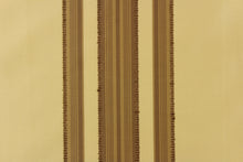 Load image into Gallery viewer, This fabric features a multi width stripe design in beige and dark brown. 
