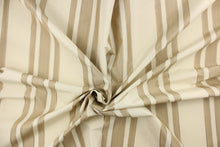 Load image into Gallery viewer, This fabric features a multi width stripe design in off white or light khaki and beige. 
