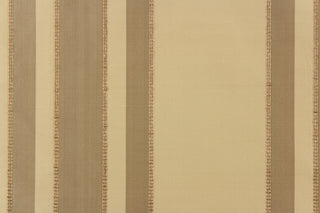 This fabric features a multi width stripe design in beige, and tan. 