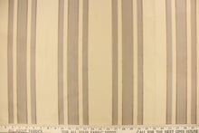 Load image into Gallery viewer, This fabric features a multi width stripe design in khaki, beige and bronze.
