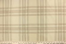 Load image into Gallery viewer,  This fabric features a plaid design in off white, light khaki, light beige, and hints of gray.
