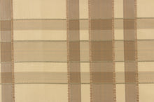Load image into Gallery viewer, This fabric features a plaid design in khaki, taupe, and light beige .
